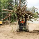 Kubota SVL75 With Quick Claw Rake 3