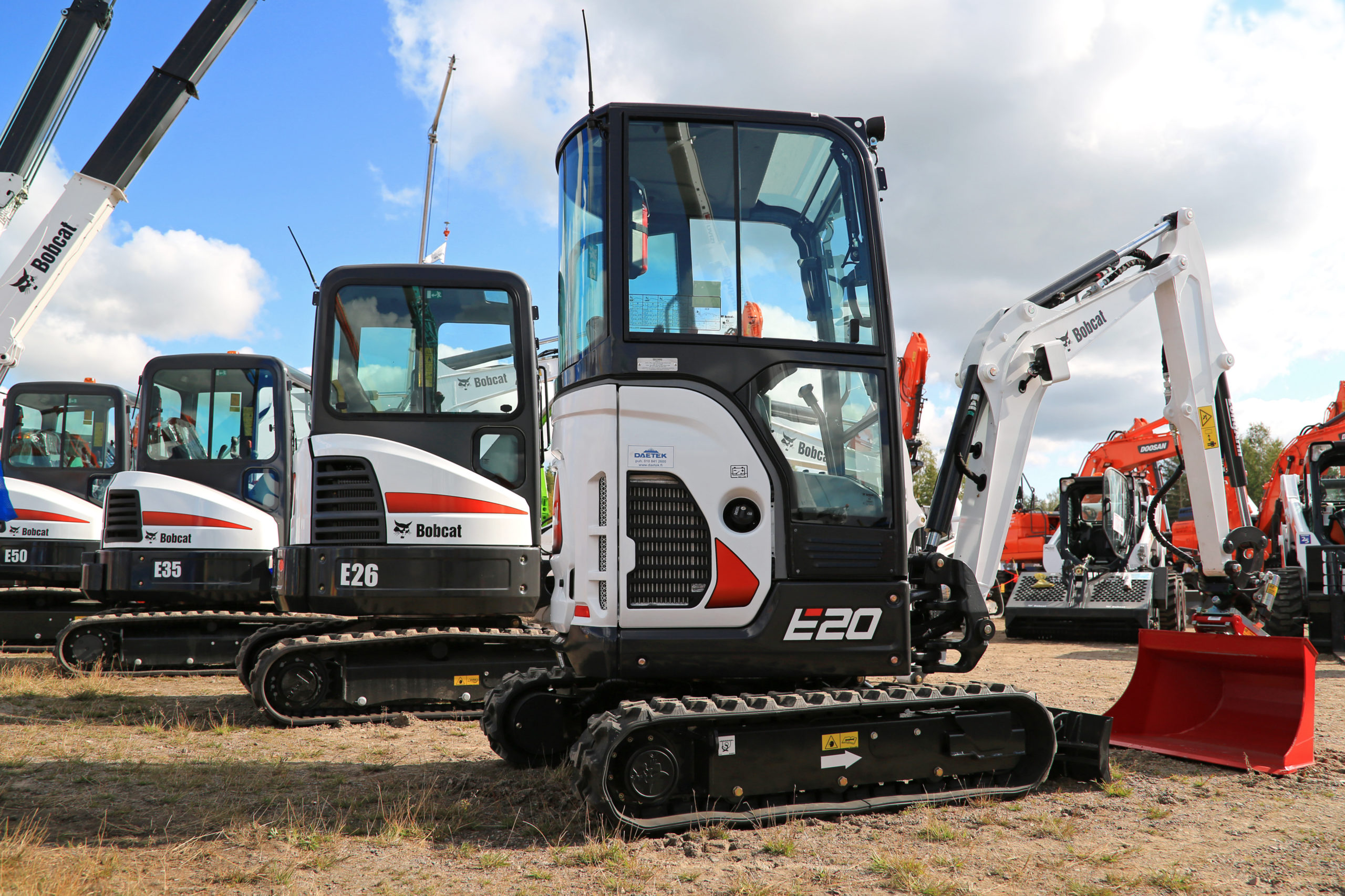 Bobcat mini excavators parked in a row